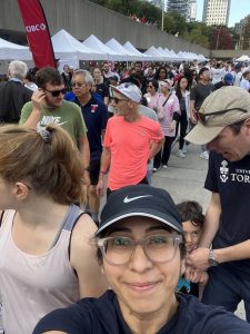 In this selfie, Assistant Professor Nazanin Khazra captures the crowds behind her. 