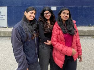 Picture of three undergraduate economics students Diya Chandna, Aditi Gupta and Natalia George