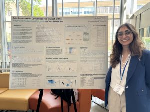 Portrait of Ruhani Walia with her research poster